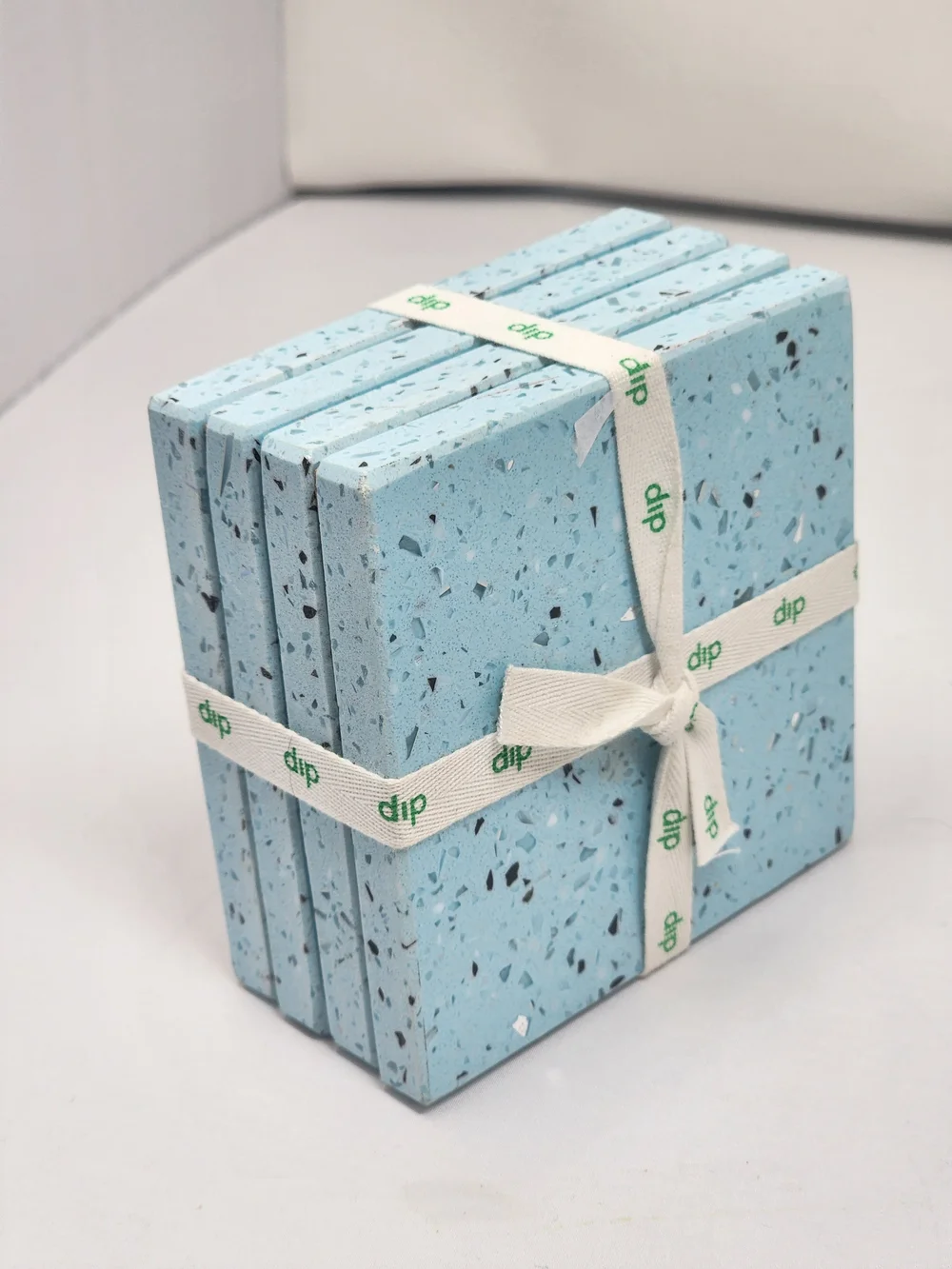 dip Light Blue Terrazzo Cork Coaster Set with Branded Cream Ribbon